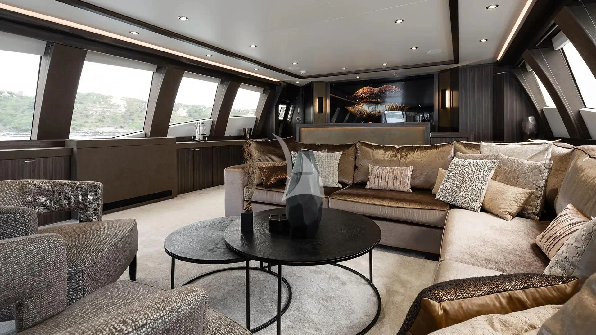 a living room with a couch and a coffee table aboard BAGHEERA Yacht for Charter