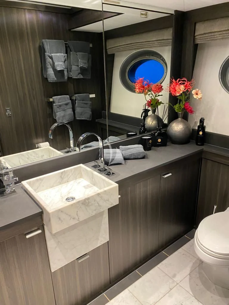 a bathroom with a large mirror aboard BAGHEERA Yacht for Charter