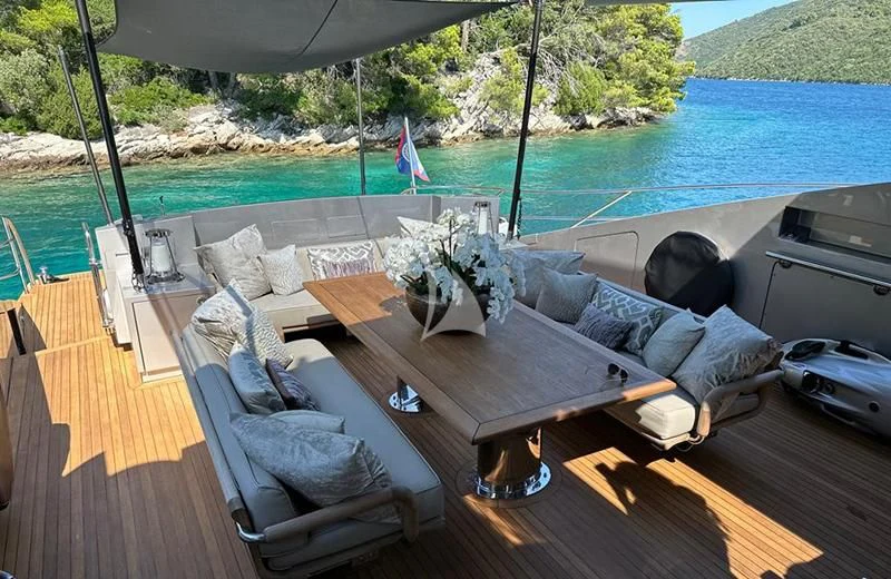 a person sleeping on a couch aboard BAGHEERA Yacht for Charter