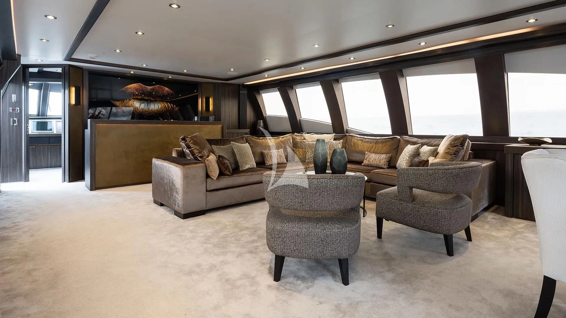 a living room with a fireplace aboard BAGHEERA Yacht for Charter