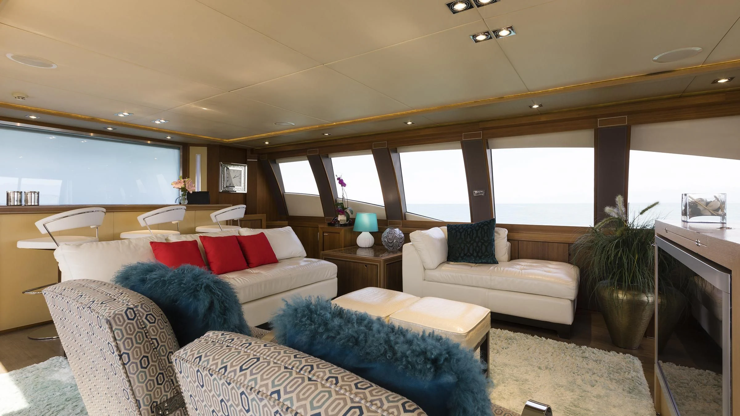a living room with a couch and a table aboard BAGHEERA Yacht for Charter