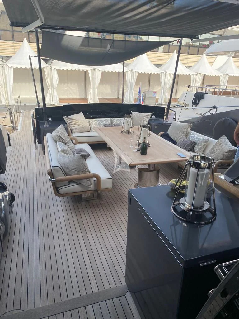 a room with a table and chairs aboard BAGHEERA Yacht for Charter