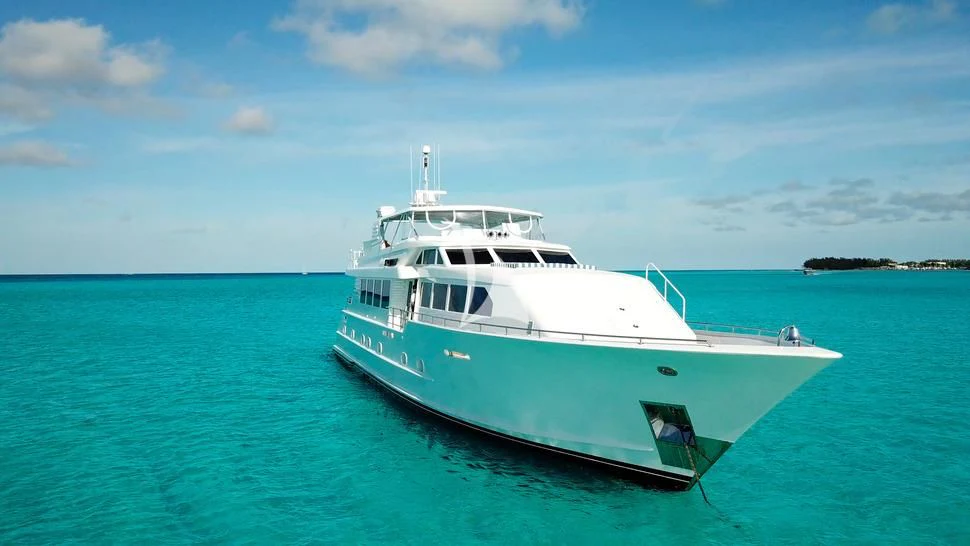 a white boat in the water aboard ISLAND VIBE Yacht for Sale