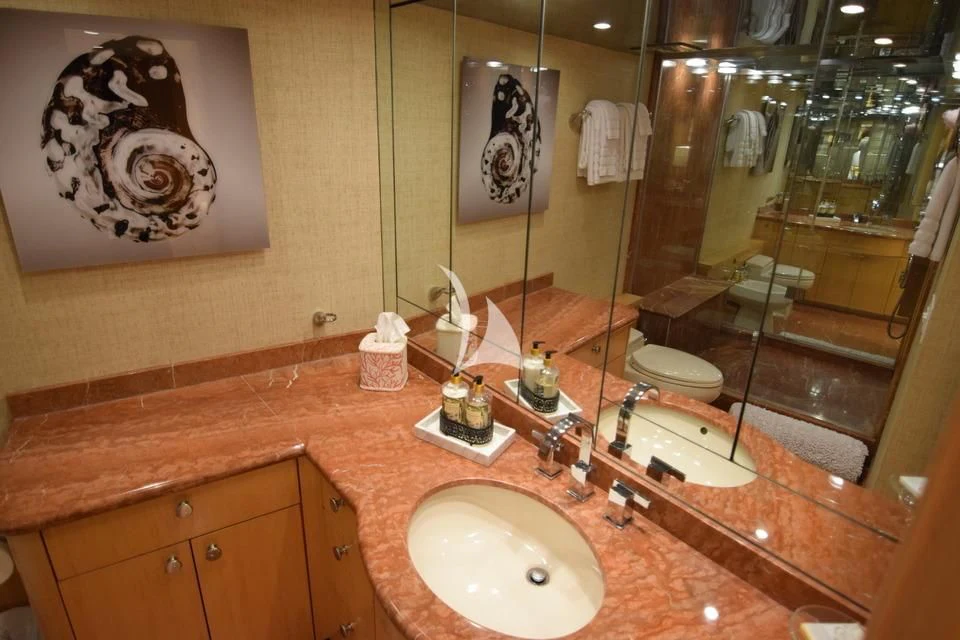 a bathroom with a large mirror aboard ISLAND VIBE Yacht for Sale