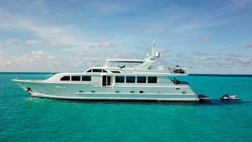 a white boat in the water aboard ISLAND VIBE Yacht for Sale