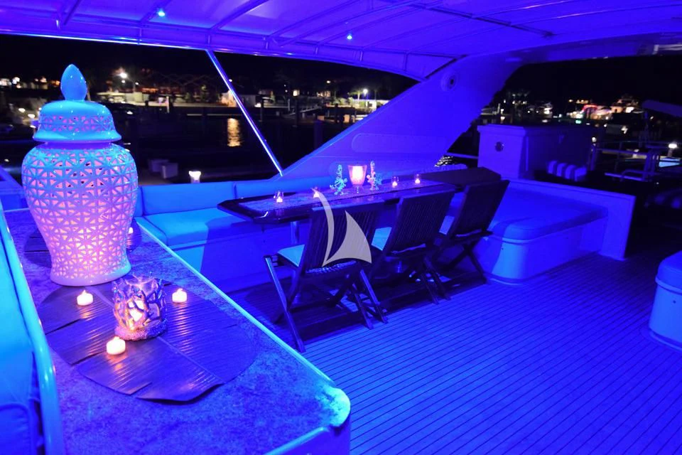a large room with a large glass vase on a table aboard ISLAND VIBE Yacht for Sale