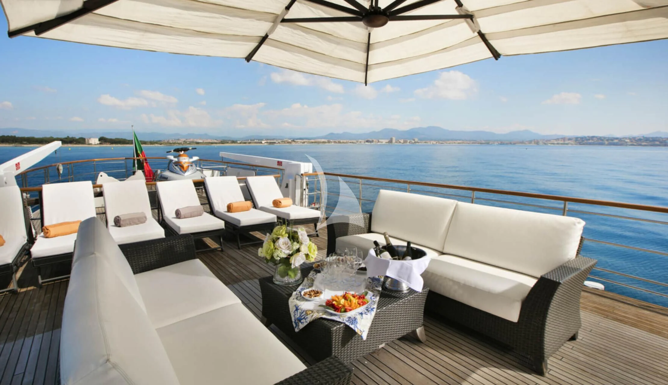a room with a table and chairs on it aboard LADY JERSEY Yacht for Charter