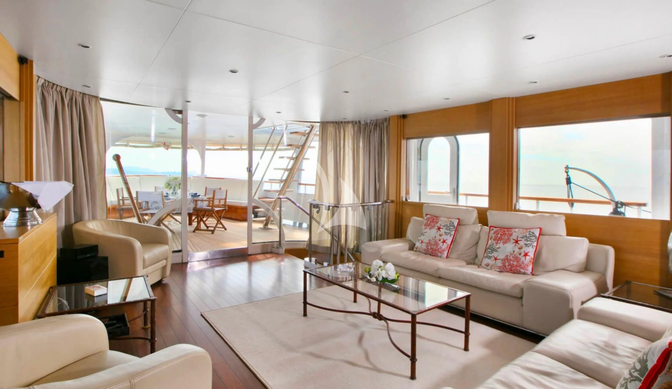 a living room with a large window aboard LADY JERSEY Yacht for Charter