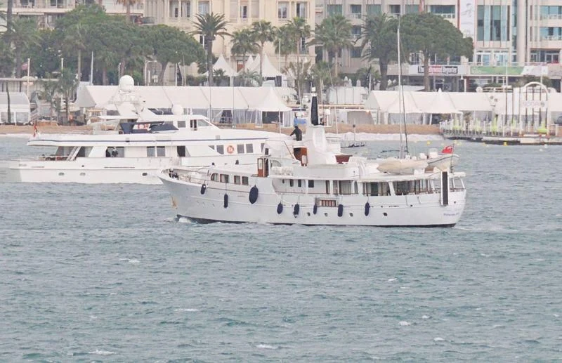 a couple of white boats in the water aboard LADY JERSEY Yacht for Charter