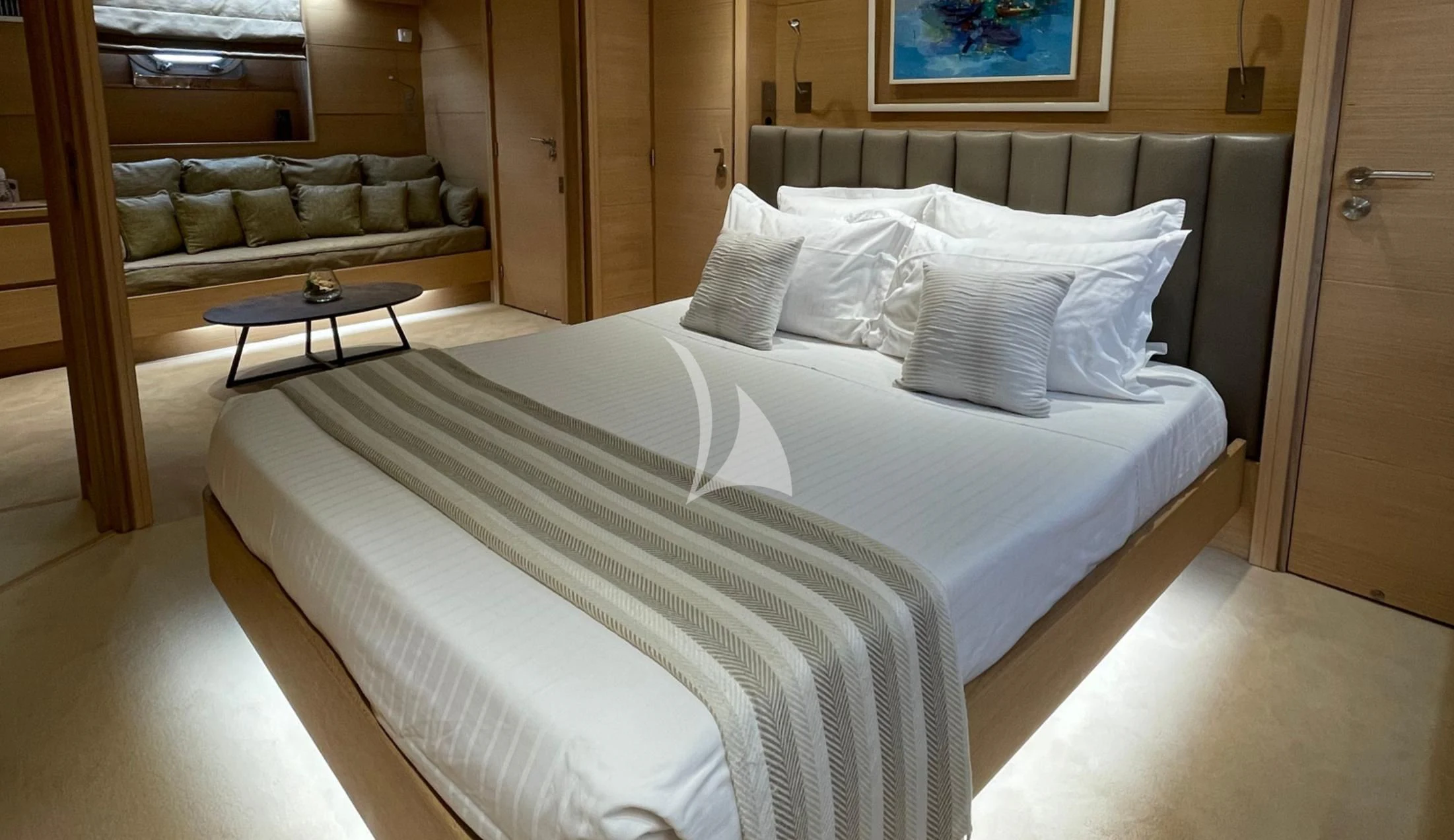 a bed with white sheets aboard LADY JERSEY Yacht for Charter