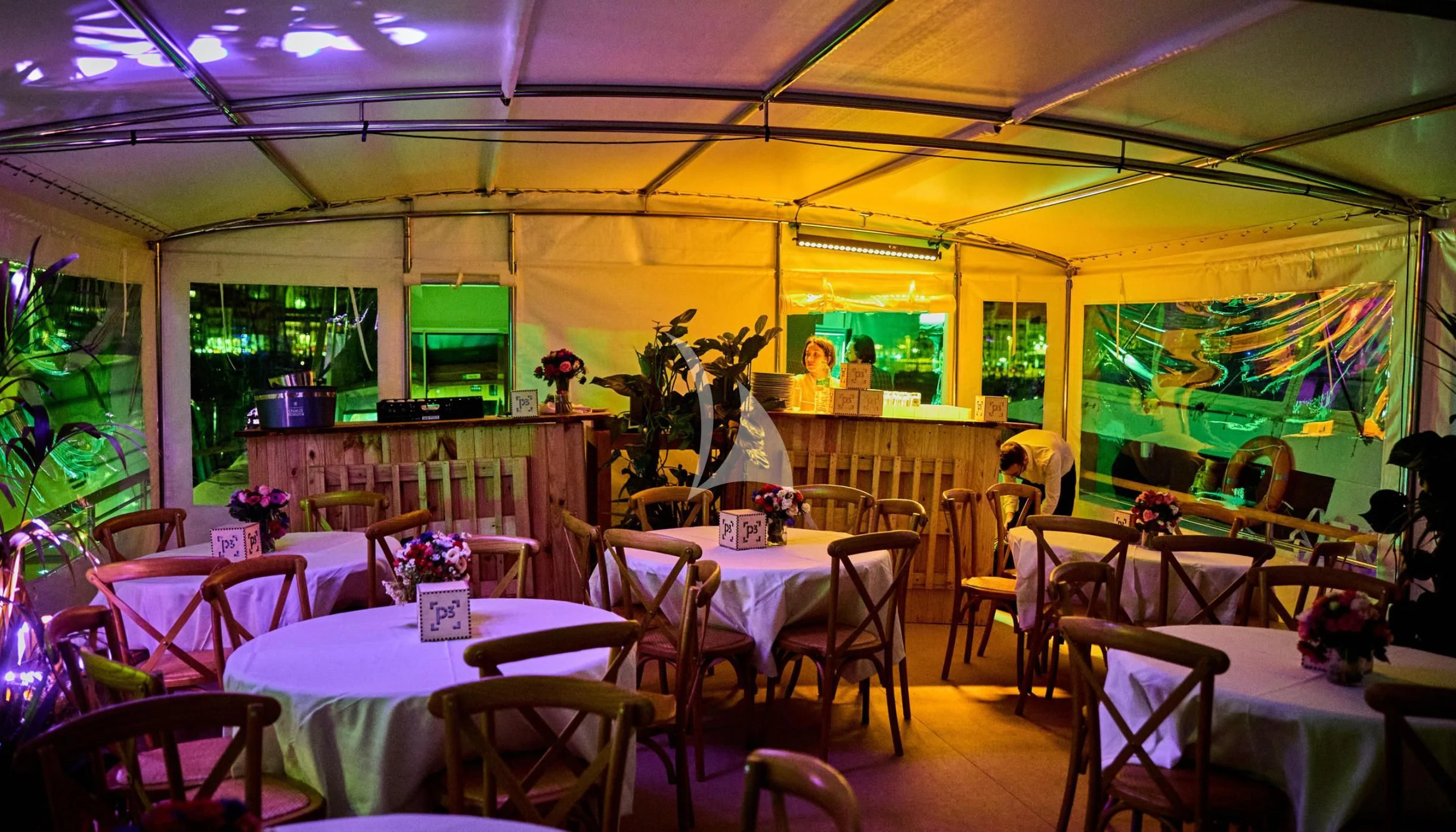 a restaurant with tables and chairs aboard LADY JERSEY Yacht for Charter