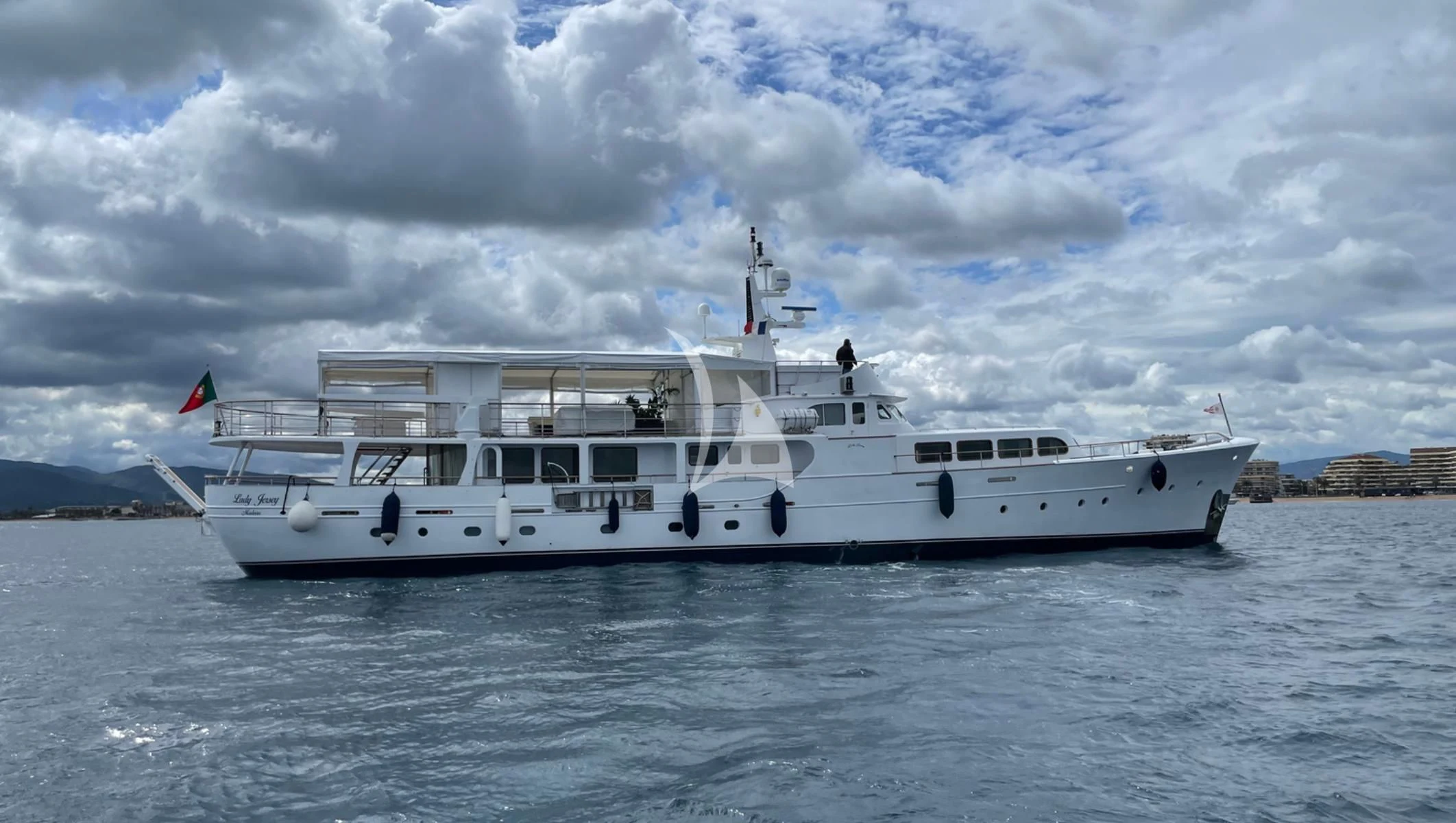 a white boat on the water aboard LADY JERSEY Yacht for Charter