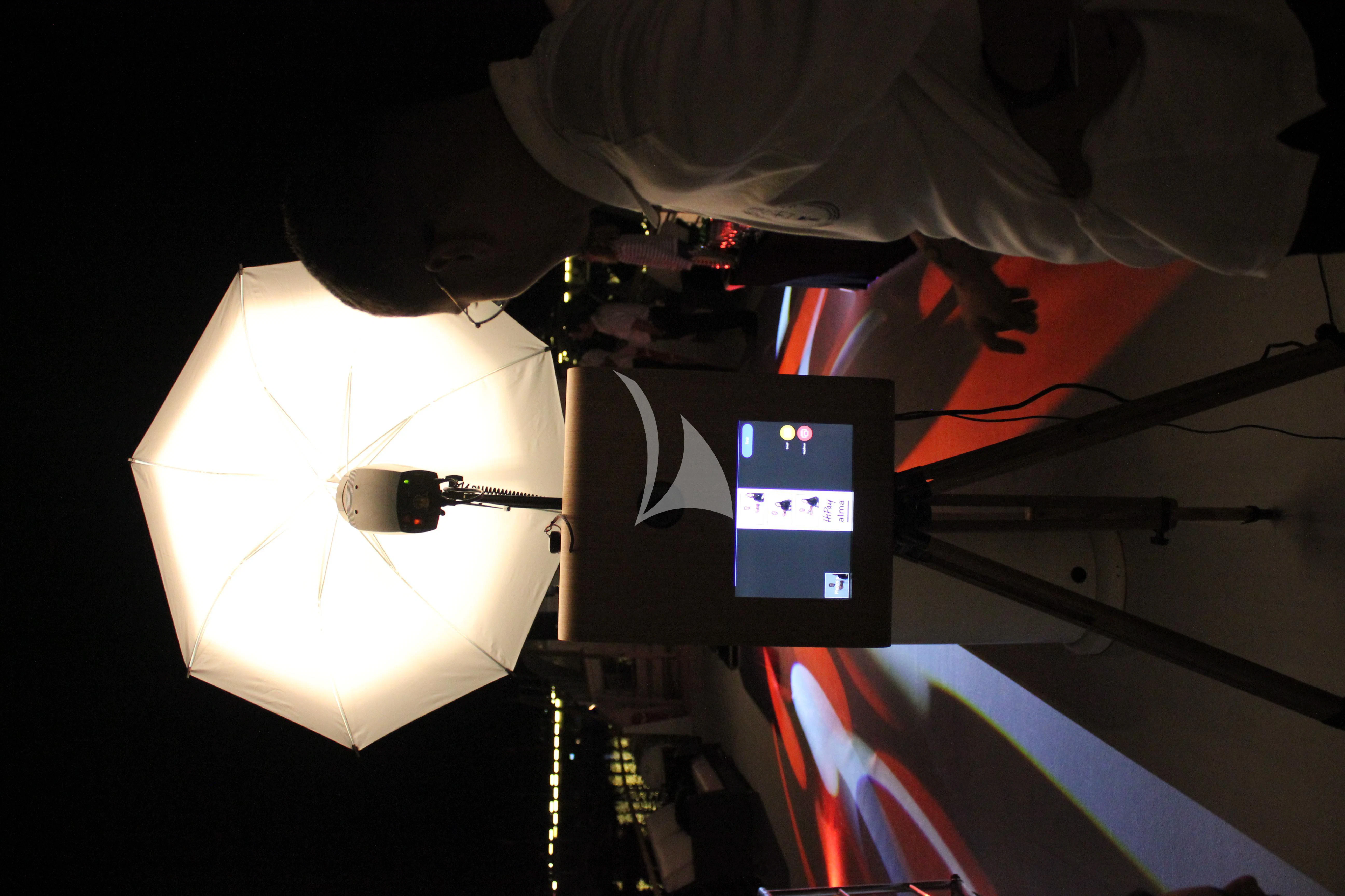 a laptop and a lamp on a table aboard LADY JERSEY Yacht for Charter