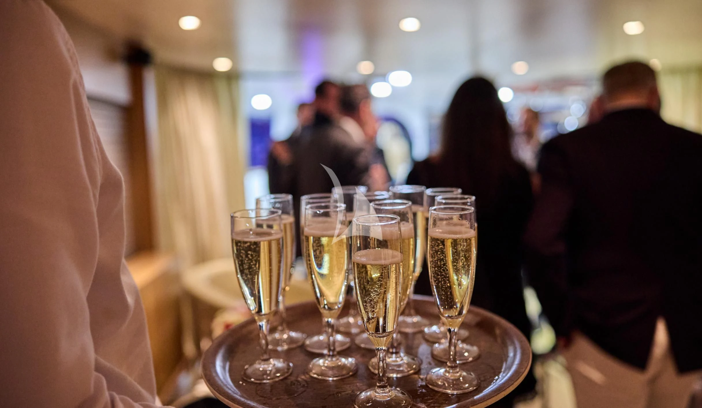 a group of people at a table with wine glasses aboard LADY JERSEY Yacht for Charter