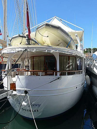 a white boat in the water aboard LADY JERSEY Yacht for Charter
