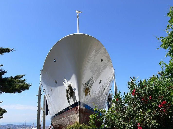 a large white religious building with a cross on top aboard LADY JERSEY Yacht for Charter