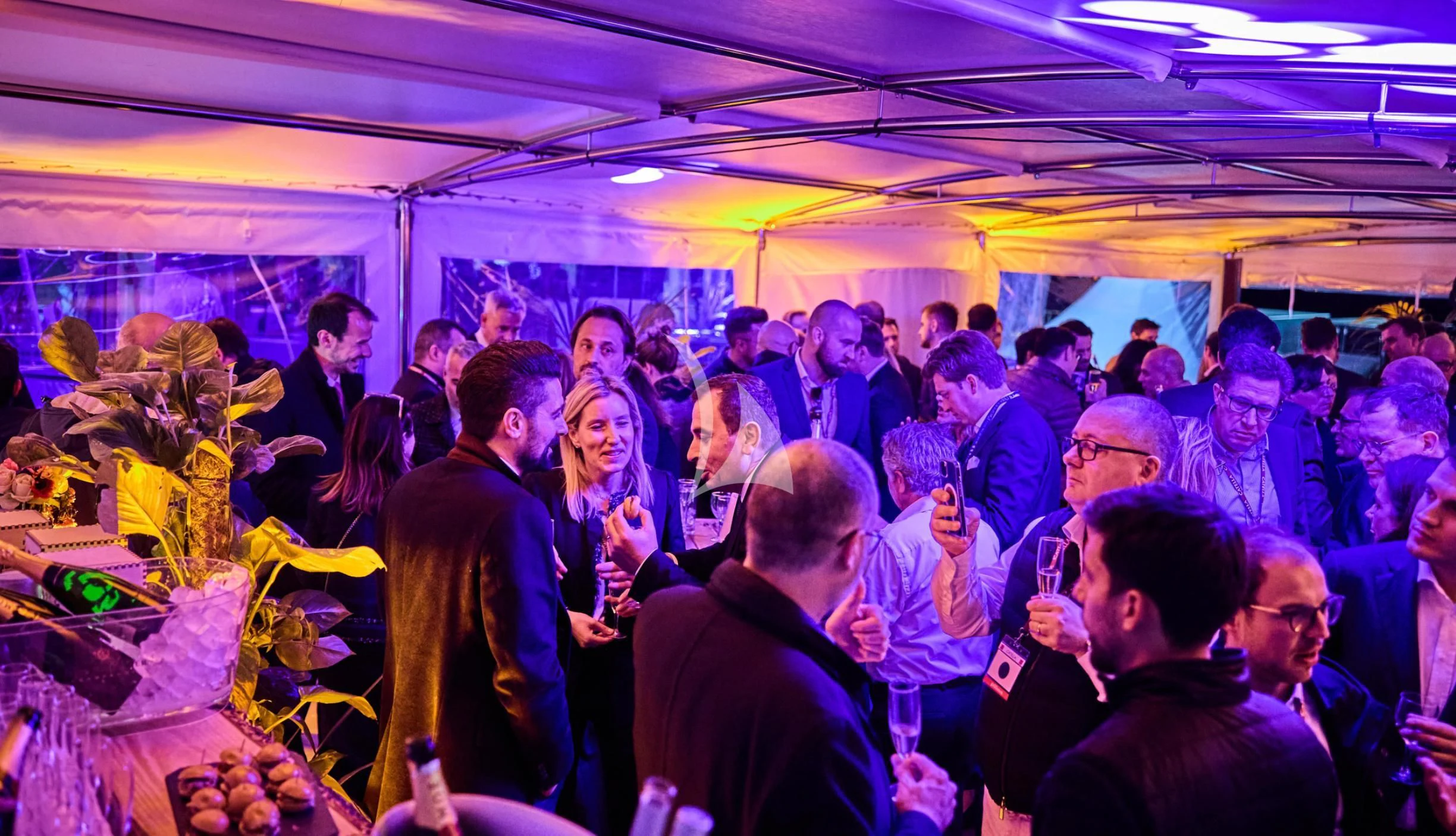 a group of people in a room aboard LADY JERSEY Yacht for Charter