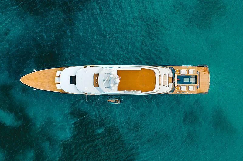 a white and gold boat on water aboard LONIAN Yacht for Sale