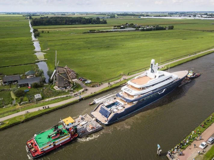 a large building with a dock aboard LONIAN Yacht for Sale