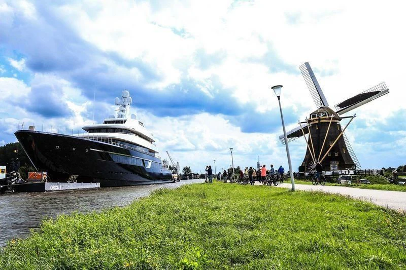 a large ship docked at a port aboard LONIAN Yacht for Sale