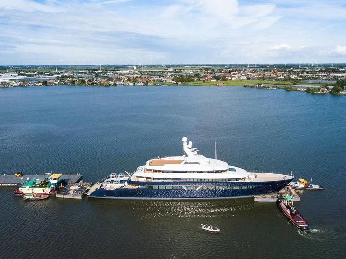a large ship in the water aboard LONIAN Yacht for Sale