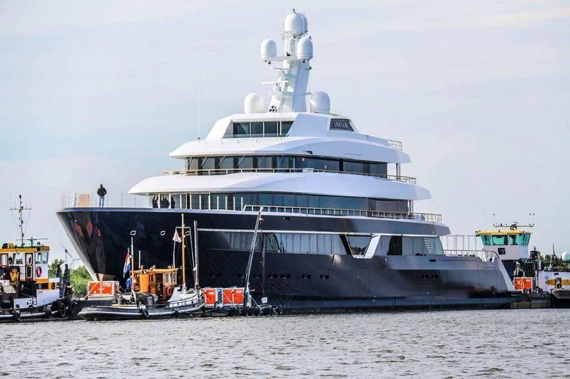 a large cruise ship docked aboard LONIAN Yacht for Sale