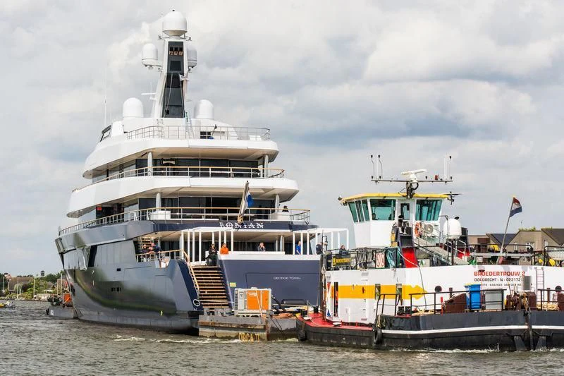 a large ship docked at a port aboard LONIAN Yacht for Sale