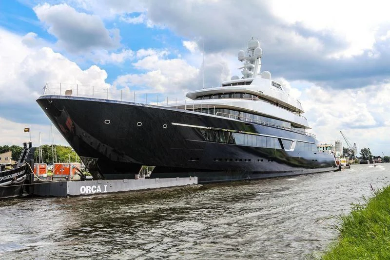 a large cruise ship docked aboard LONIAN Yacht for Sale
