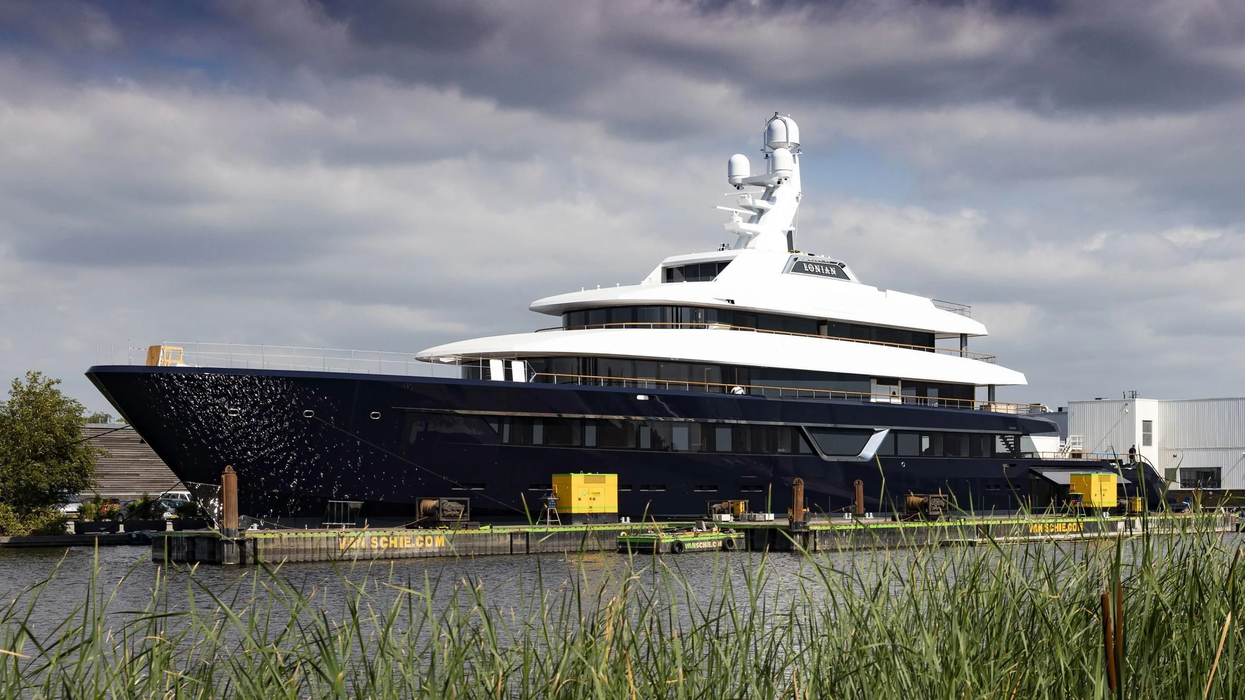 a cruise ship docked aboard LONIAN Yacht for Sale