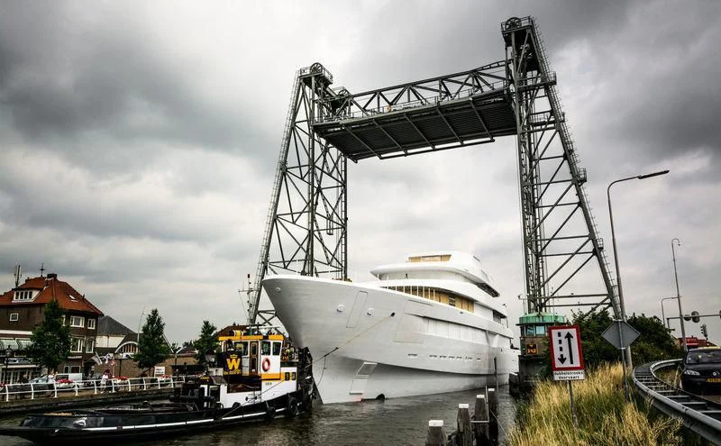 a large white boat docked aboard LONIAN Yacht for Sale