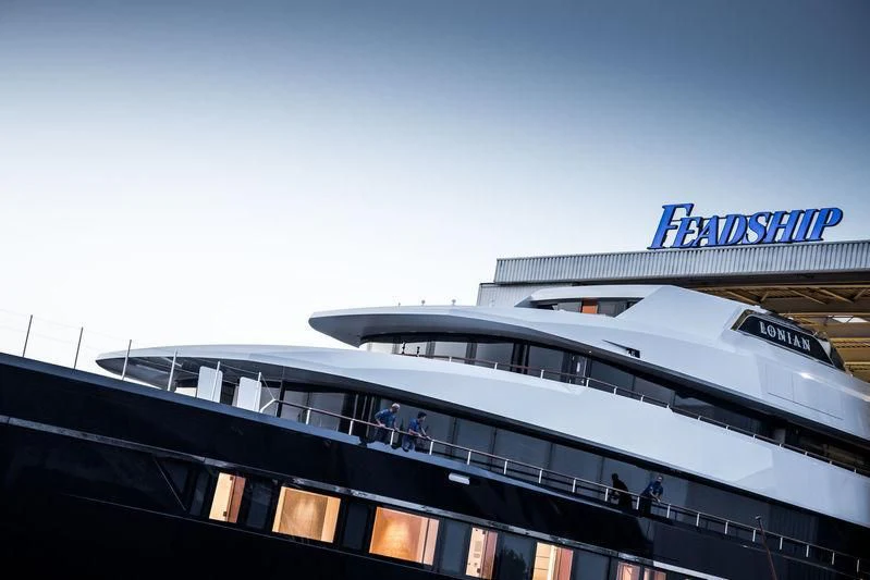 a building with a sign on the roof aboard LONIAN Yacht for Sale