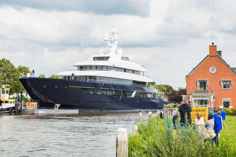 a large boat on the water aboard LONIAN Yacht for Sale