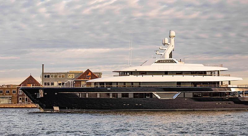 a large cruise ship docked aboard LONIAN Yacht for Sale