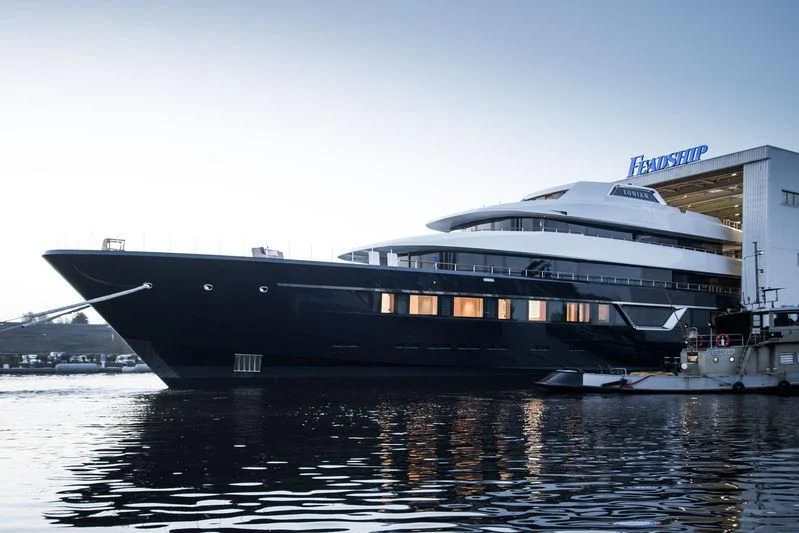 a large building with a boat in the water aboard LONIAN Yacht for Sale