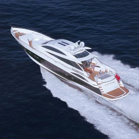 a white yacht in the water aboard CASINO ROYALE Yacht for Sale