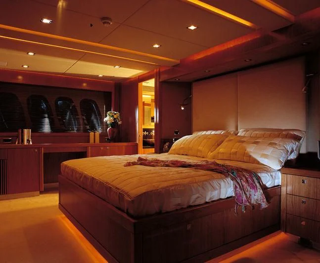 a bed in a room aboard CASINO ROYALE Yacht for Sale