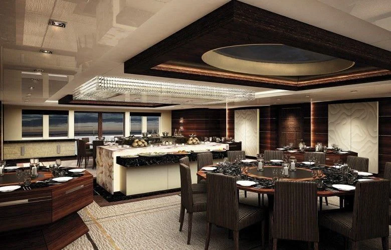a large kitchen with a large dining table and chairs aboard MARYAH Yacht for Sale
