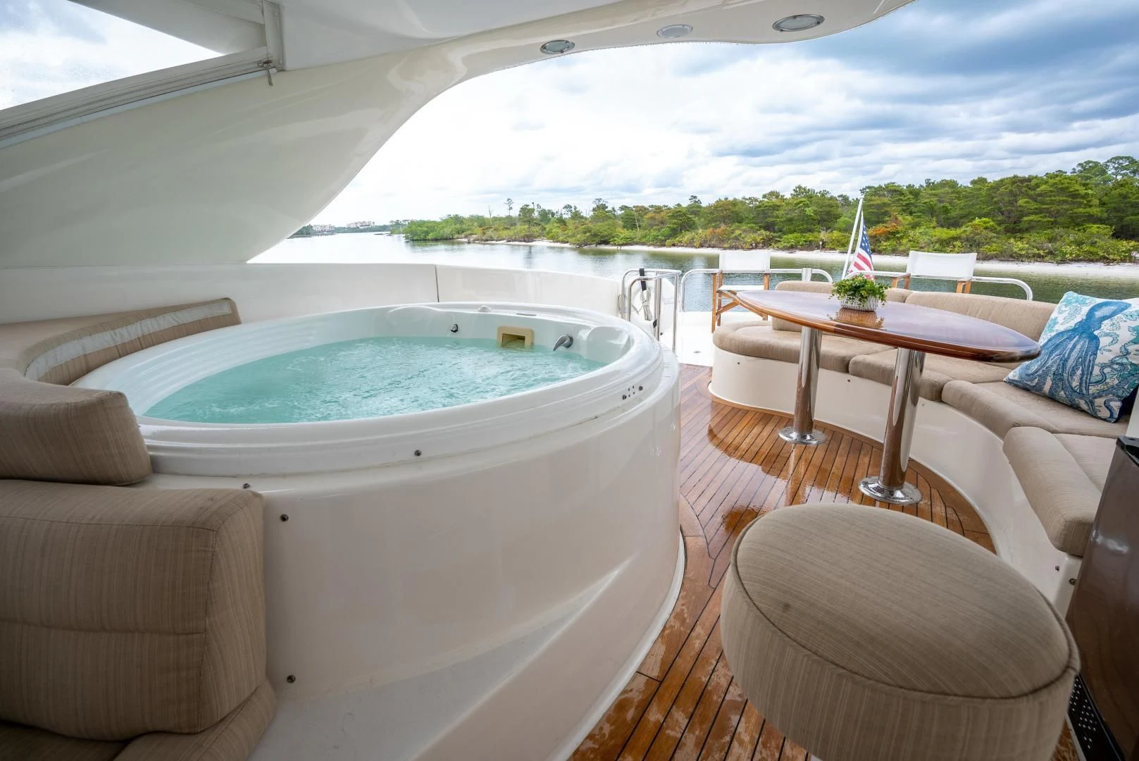 a room with a table and chairs aboard STARFIRE Yacht for Sale
