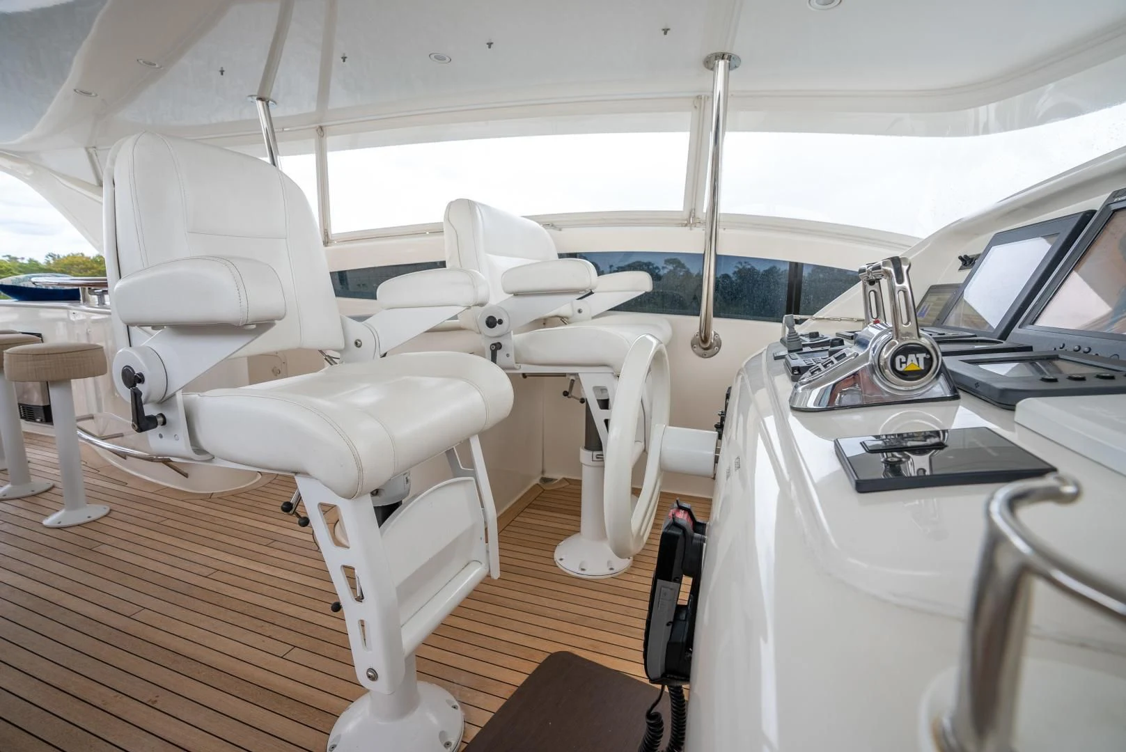 a white tent with a table and chairs aboard STARFIRE Yacht for Sale