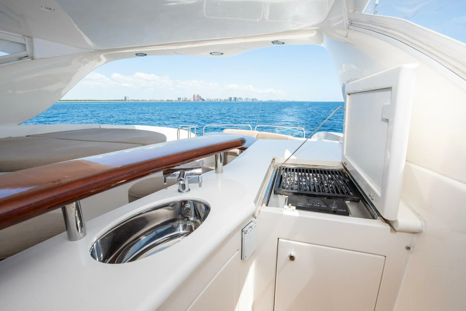 a boat with a sink and a laptop on it aboard STARFIRE Yacht for Sale