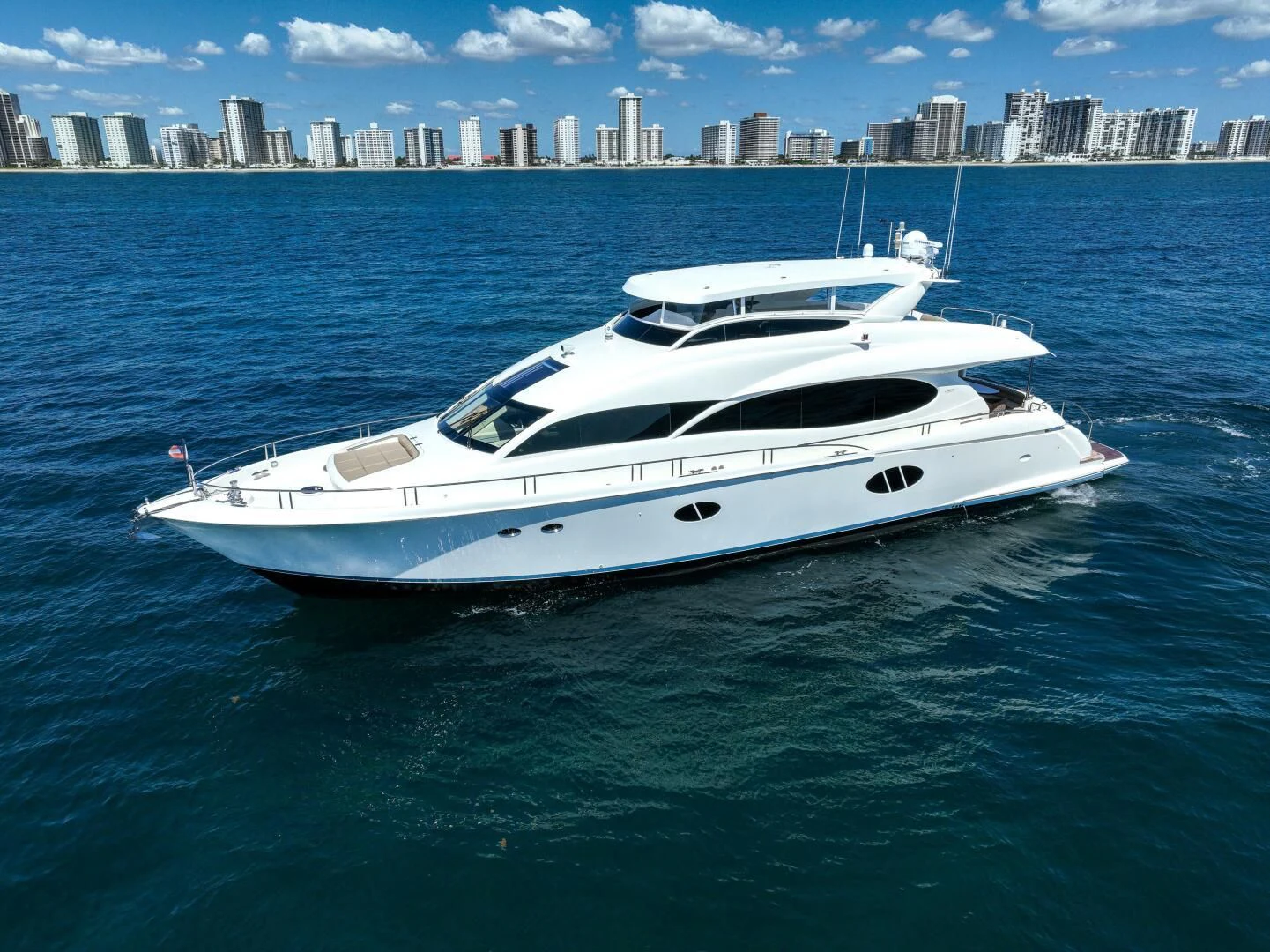 a white yacht in the water aboard STARFIRE Yacht for Sale