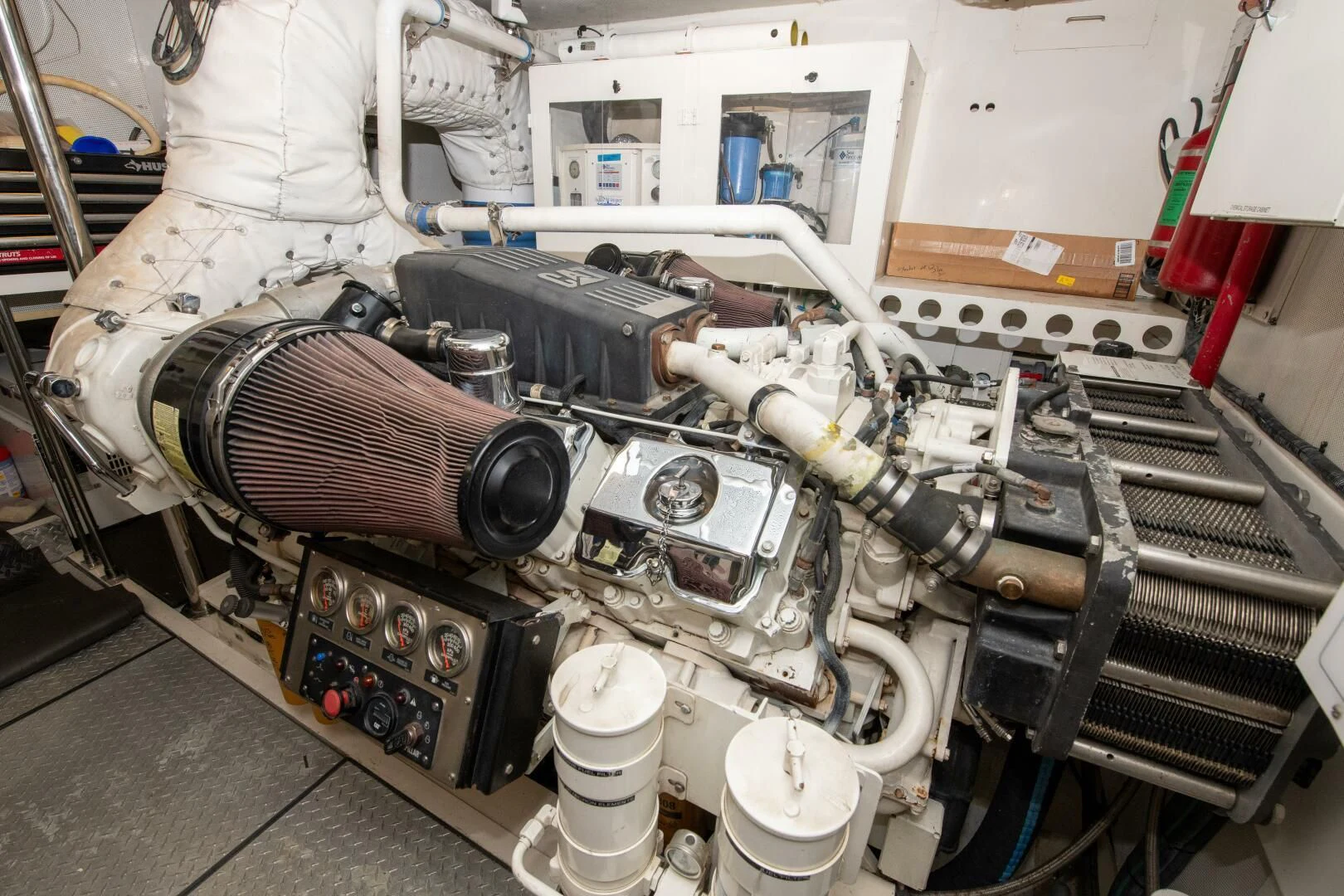 a machine with a large metal cylinder aboard STARFIRE Yacht for Sale