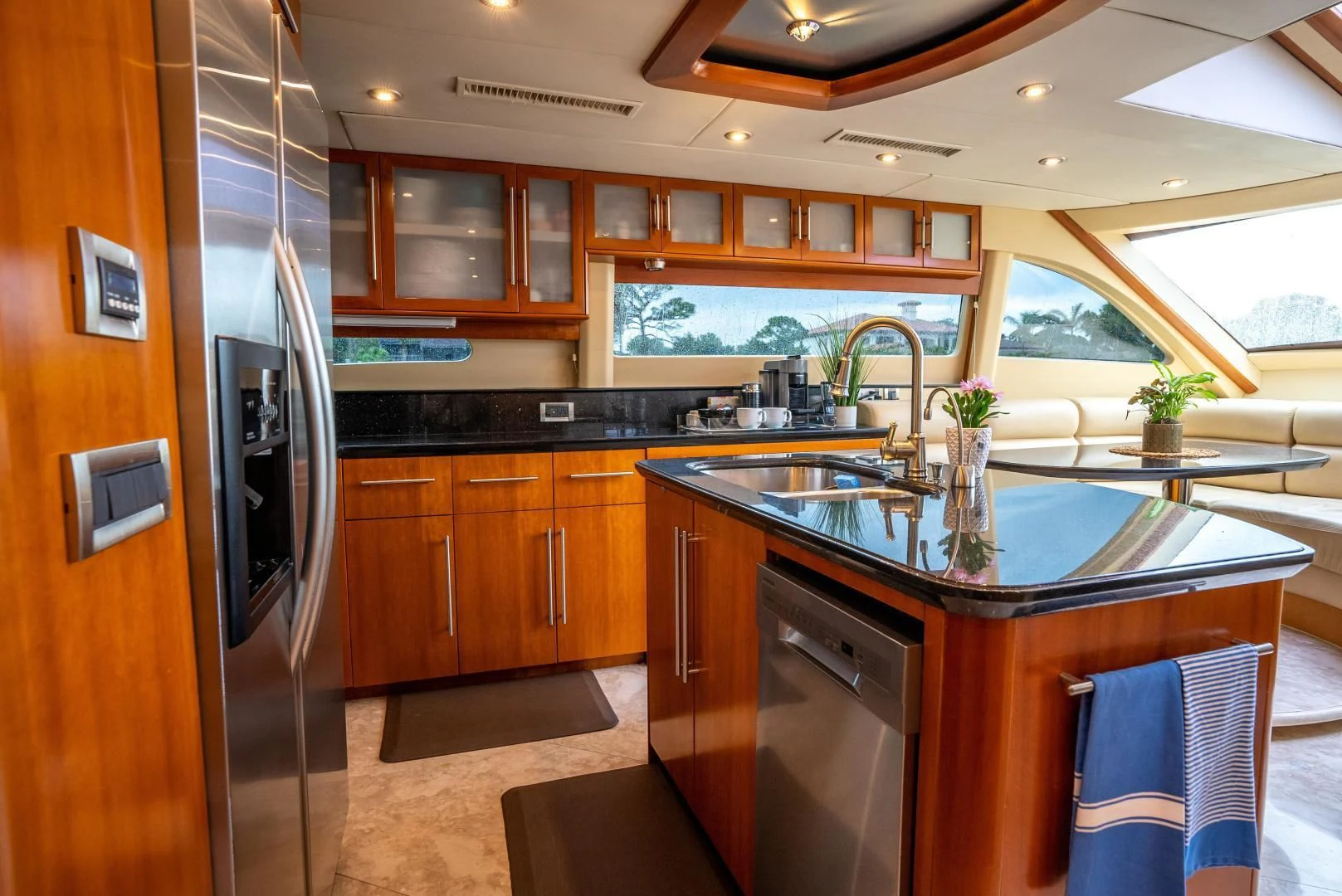 a kitchen with a large island aboard STARFIRE Yacht for Sale