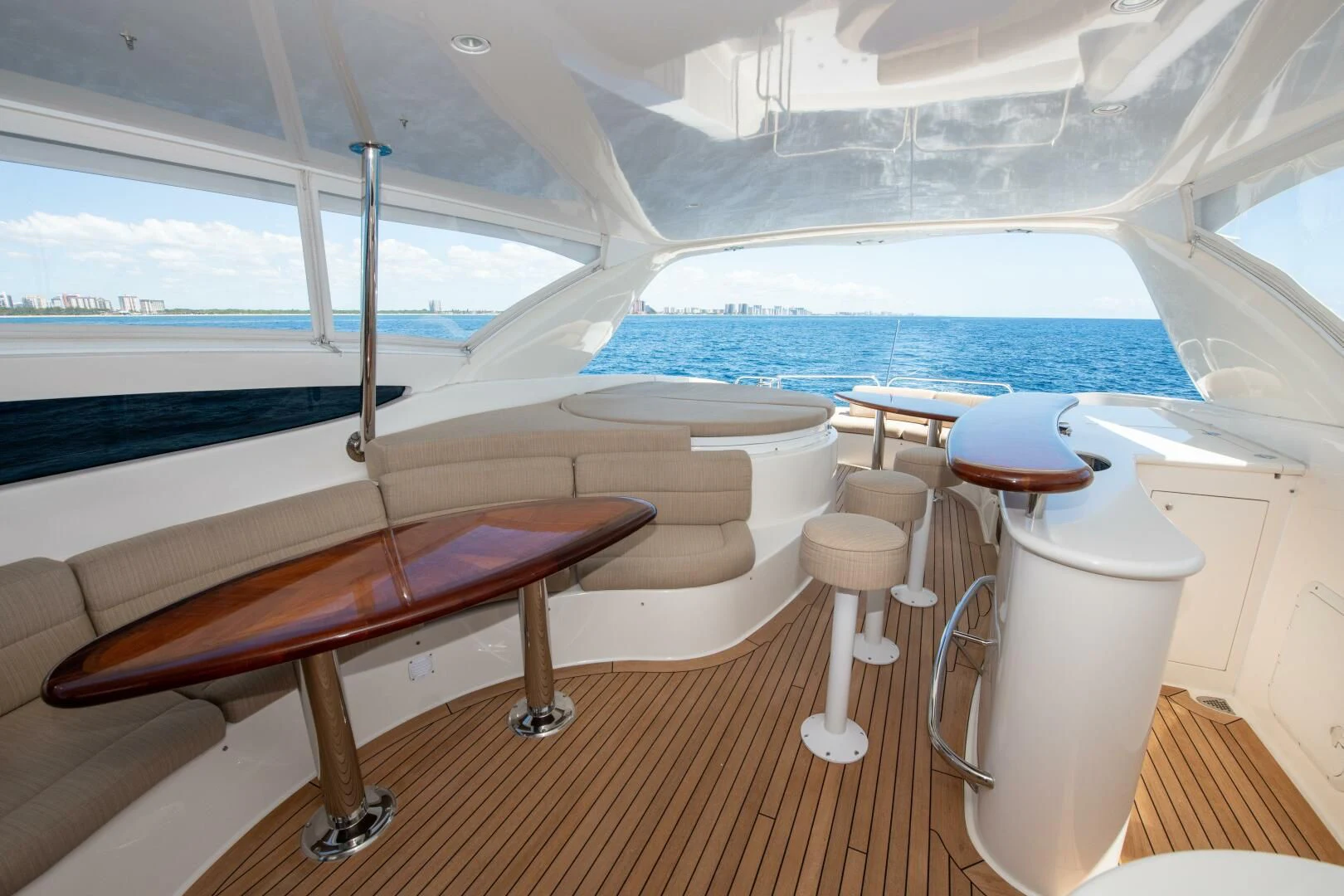 a room with a table and chairs aboard STARFIRE Yacht for Sale