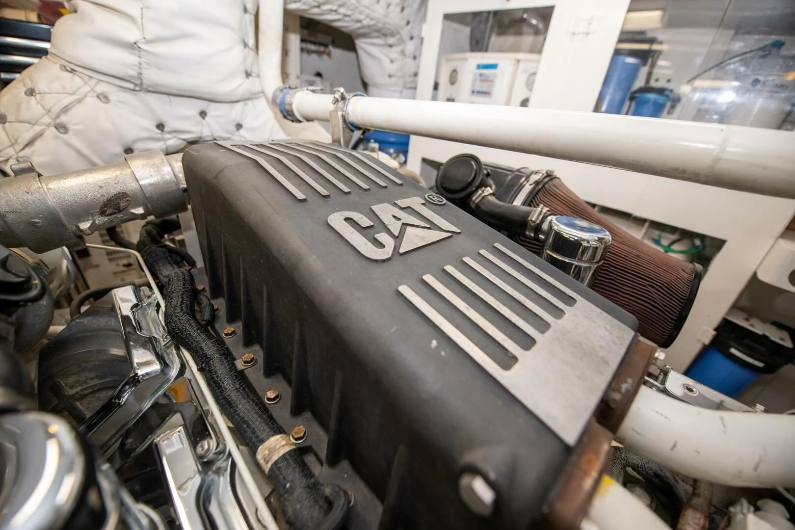 a machine with a large metal cylinder aboard STARFIRE Yacht for Sale