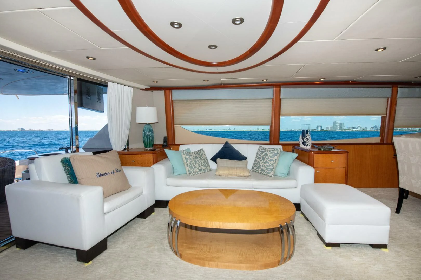 a living room with a large window aboard STARFIRE Yacht for Sale