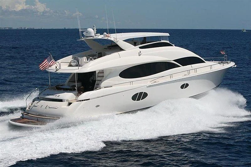 a white yacht on the water aboard STARFIRE Yacht for Sale