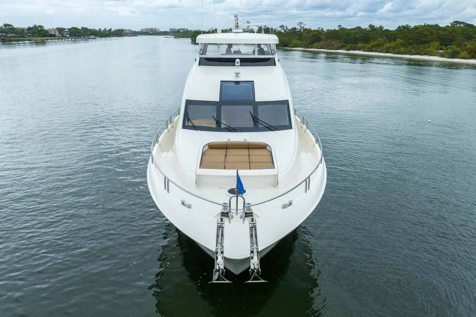 a white boat on the water aboard STARFIRE Yacht for Sale