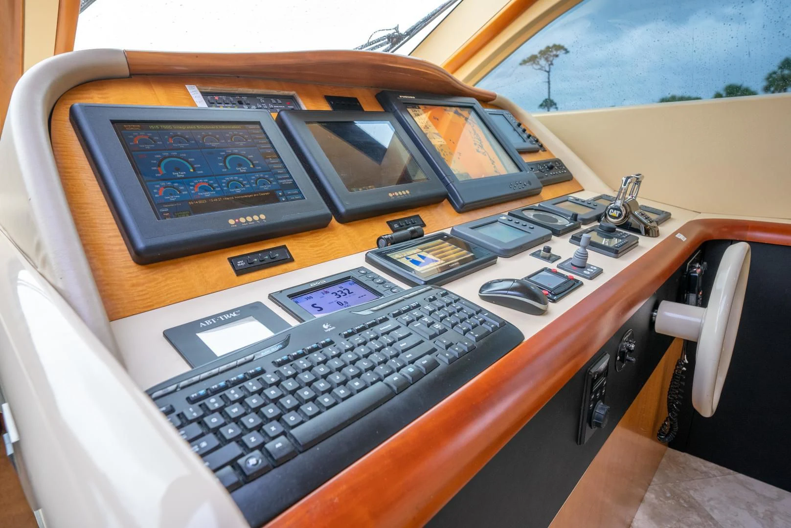 a laptop computer on a table aboard STARFIRE Yacht for Sale