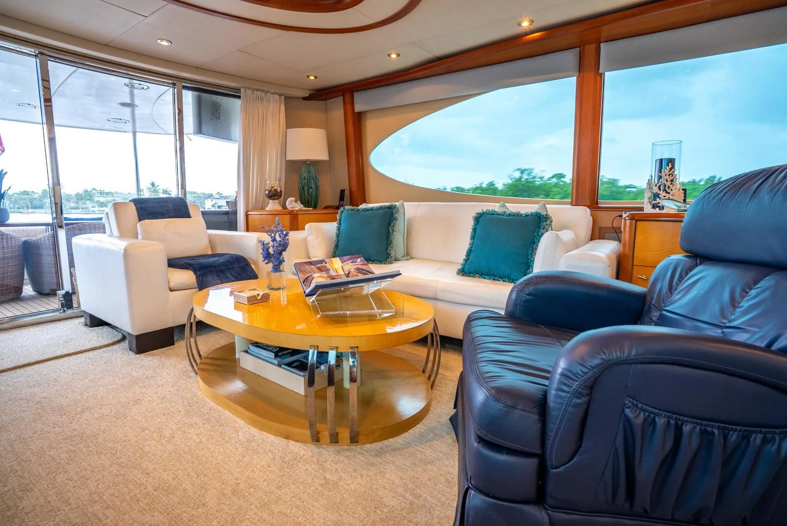 a living room with a large window aboard STARFIRE Yacht for Sale